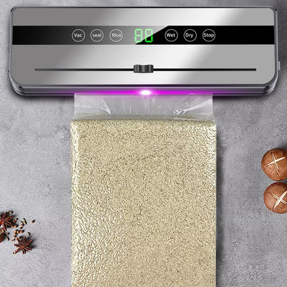 Machine de mise sous vide électrique pour la conservation des aliments : bouton tactile, fonction sèche/humide, coupe-aliments intégré, idéale pour la cuisine.