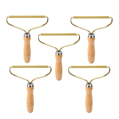 Brosse anti-poils portable pour tapis, laine, manteaux et vêtements.