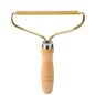 Brosse anti-poils portable pour tapis, laine, manteaux et vêtements.