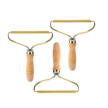 Brosse anti-poils portable pour tapis, laine, manteaux et vêtements.
