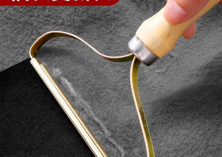 Brosse anti-poils portable pour tapis, laine, manteaux et vêtements.