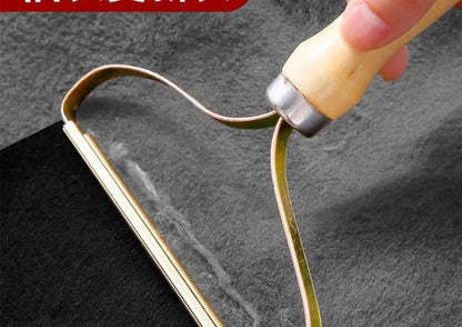 Brosse anti-poils portable pour tapis, laine, manteaux et vêtements.