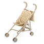 Poussette pliable de haute qualité pour poupée avec motif de fleurs.