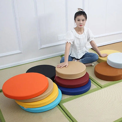 Coussin rond pratique en cuir, épais et doux, rembourré, lavable et imperméable.