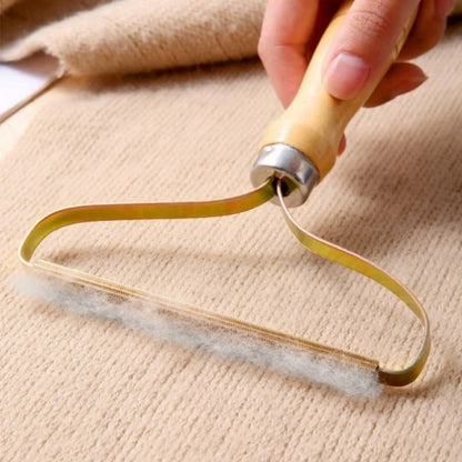 Brosse anti-poils portable pour tapis, laine, manteaux et vêtements.