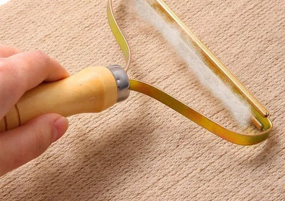 Brosse anti-poils portable pour tapis, laine, manteaux et vêtements.