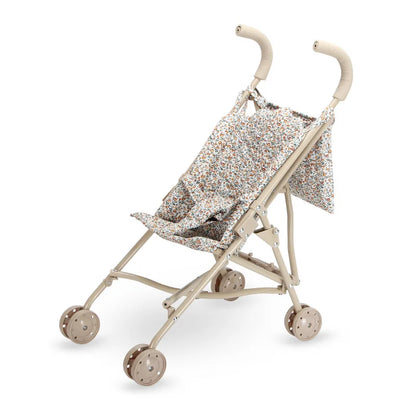 Poussette pliable de haute qualité pour poupée avec motif de fleurs.